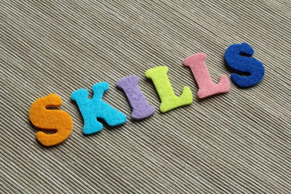 skills word made with felt letters