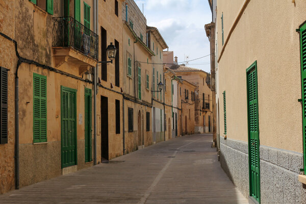 One of the charming street in old town of Alcudia, Majorca, Spain
