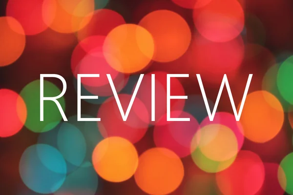 review text on colorful bokeh background