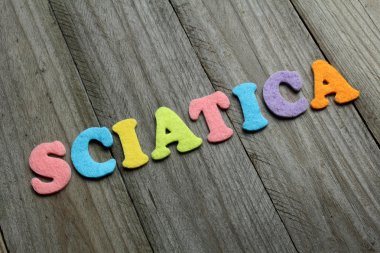 ahşap arka plan siyatik kelime. Tıp kavramı