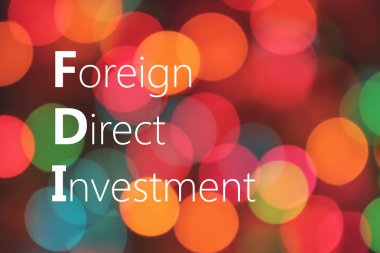 FDI (doğrudan yabancı yatırım) kısaltma renkli bokeh backgrund üzerinde