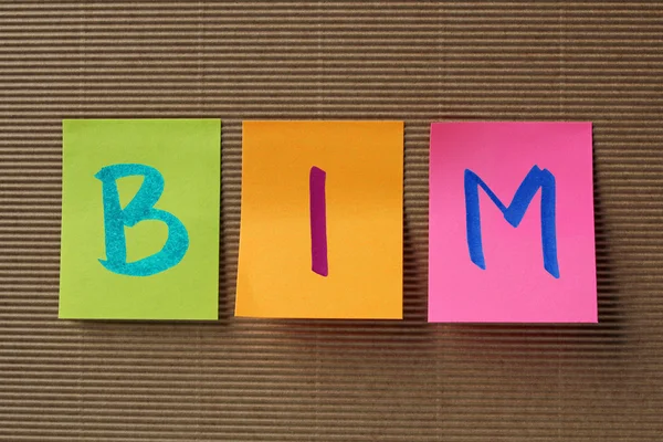 BIM (Building Information Modeling) rövidítése, a színes öntapadó jegyzetek — Stock Fotó