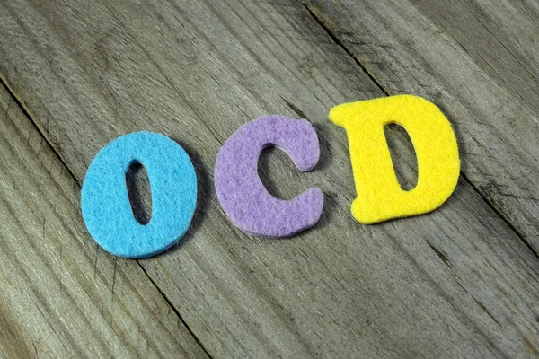OCD (Nerwica natręctw) skrót na podłoże drewniane — Zdjęcie stockowe