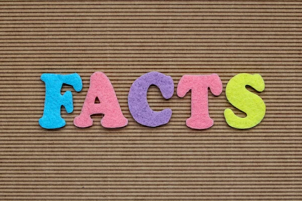 Facts word on cardboard background — Stock Photo, Image