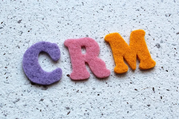 客户关系管理 （Crm) 首字母缩略词上手工纸纹理 — 图库照片