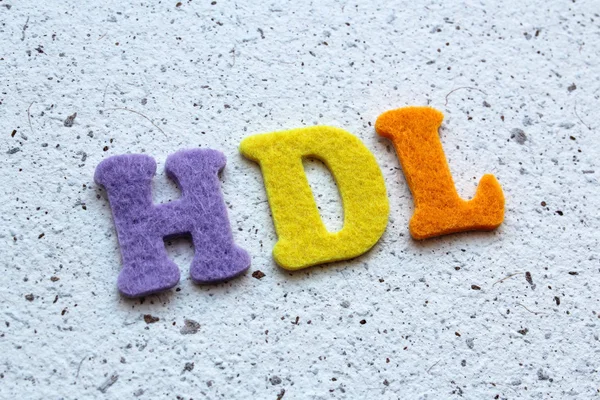 HDL (High-density lipoprotein) akronym på handgjort papper konsistens — Stockfoto