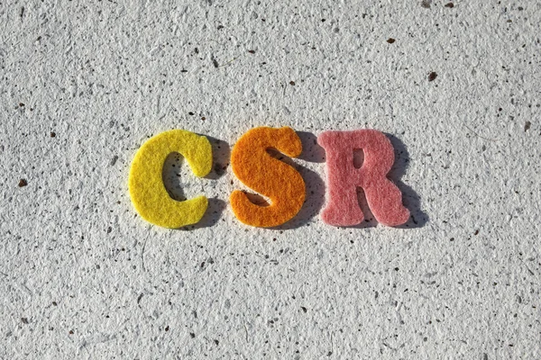 Csr (Corporate Social Responsibility) Akronym auf Büttenpapier — Stockfoto