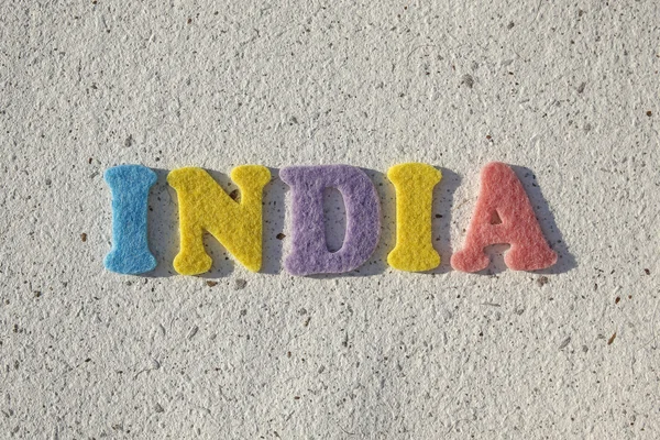 Indien word på handgjort papper konsistens — Stockfoto