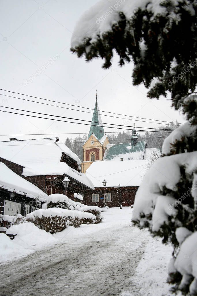 picturesque historical architecture of Lanckorona village in southern Poland during snowstorm