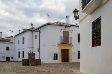 typical street in historic district of Ronda- very popular tourists town in Andalusia, Spain