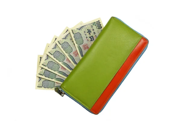 Notas de iene japonês e carteira de couro — Fotografia de Stock