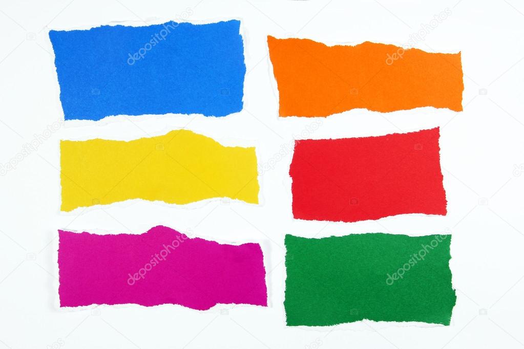 Colorful torn paper on white background