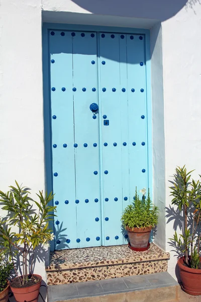 Beautiful blue spanish wooden door — Stock Photo, Image