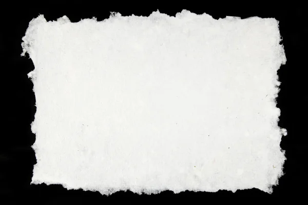 Papel blanco hecho a mano sobre fondo negro — Foto de Stock