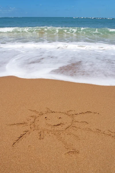 Sun drawn on the sandy beach — Stock Photo, Image