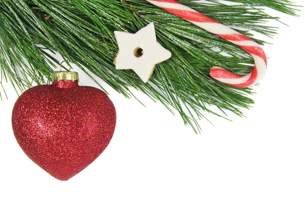 Abete di Natale, bauble rosso e canna da zucchero — Foto Stock