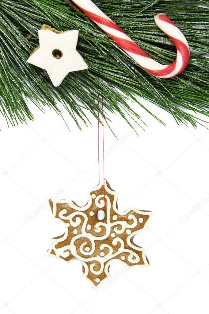 Christmas snowflake gingerbread, cane, star and fir tree on white background
