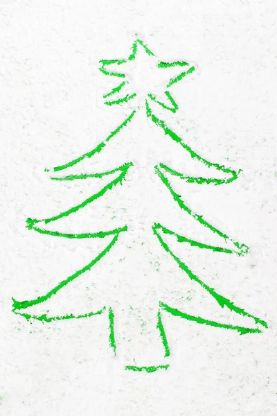 Green christmas tree drawn in the snow — Stock Photo, Image