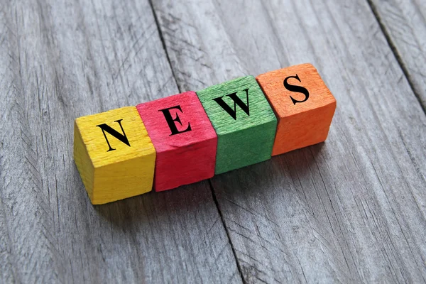 Concept of news word on wooden cubes — Stock Photo, Image