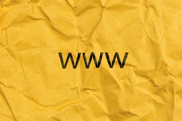 Text www på gult papper — Stockfoto