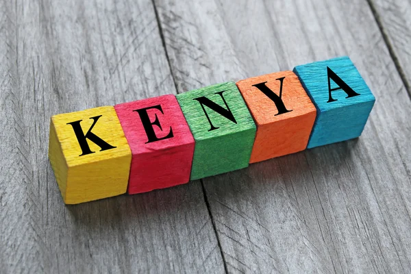 Palabra kenya en cubos de madera de colores —  Fotos de Stock