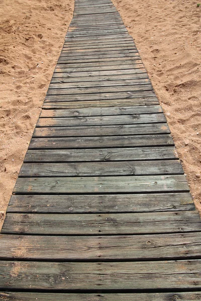 Wooden path in sand — Stock Photo, Image