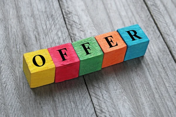 Word offer on colorful wooden cubes — Stock Photo, Image