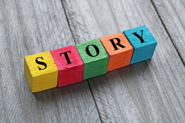 word story on colorful wooden cubes