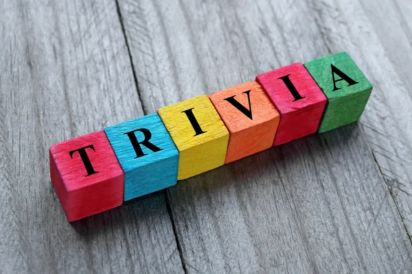 Word trivia on colorful wooden cubes — 스톡 사진