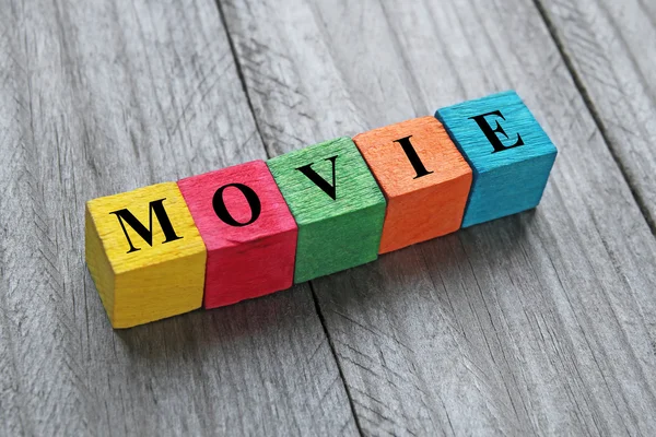 Word movie on colorful wooden cubes — Stock Photo, Image