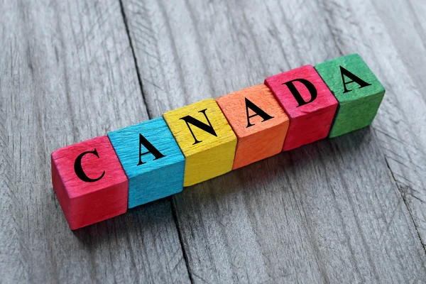 Word Canada on colorful wooden cubes — Stock Photo, Image