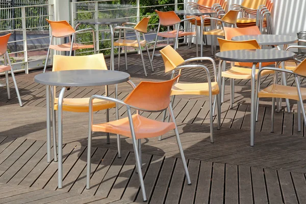 Chairs and tables in empty restaurant — Stock Photo, Image