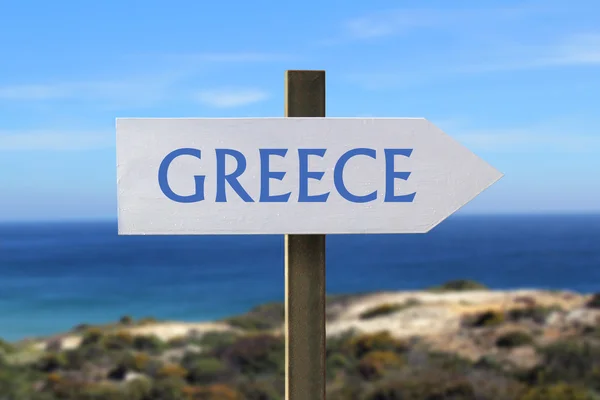 Greece sign with seaside in the background — Stock Photo, Image