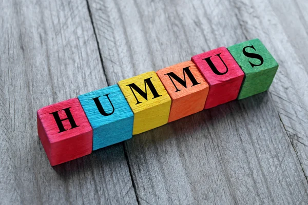 Hummus text on colorful wooden cubes — Stock Photo, Image