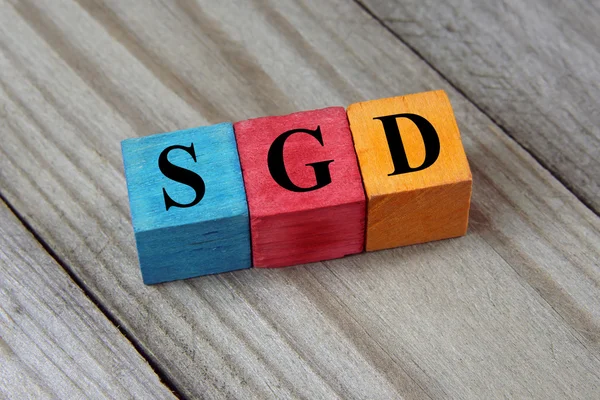 SGD (Singapore Dollar) sign on colorful wooden cubes — Stock Photo, Image