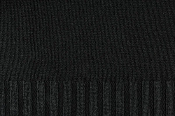 Black wool sweater background — Stock Photo, Image