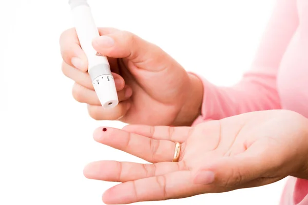 Closeup Woman Measuring Glucose Level Using Hand Test Lancelet Finger — Stock Photo, Image