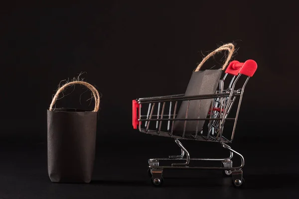 Black Friday Sale Shopping Concept Black Shopping Bags Een Winkelwagen — Stockfoto