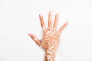 Tek kullanımlık kadın eli. Tek kullanımlık plastik eldiven. Stüdyo resmi beyaz arka planda izole edilmiş.