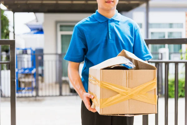 Asian Young Delivery Man Blue Uniform Emotional Falling Courier Hold — Stock Photo, Image