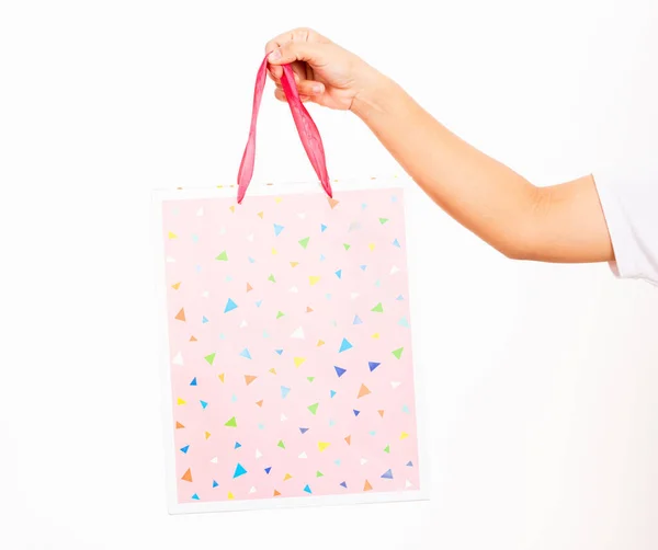 Closeup Women Hand Holding Colorful Pink Shopping Bag Studio Shot — Zdjęcie stockowe