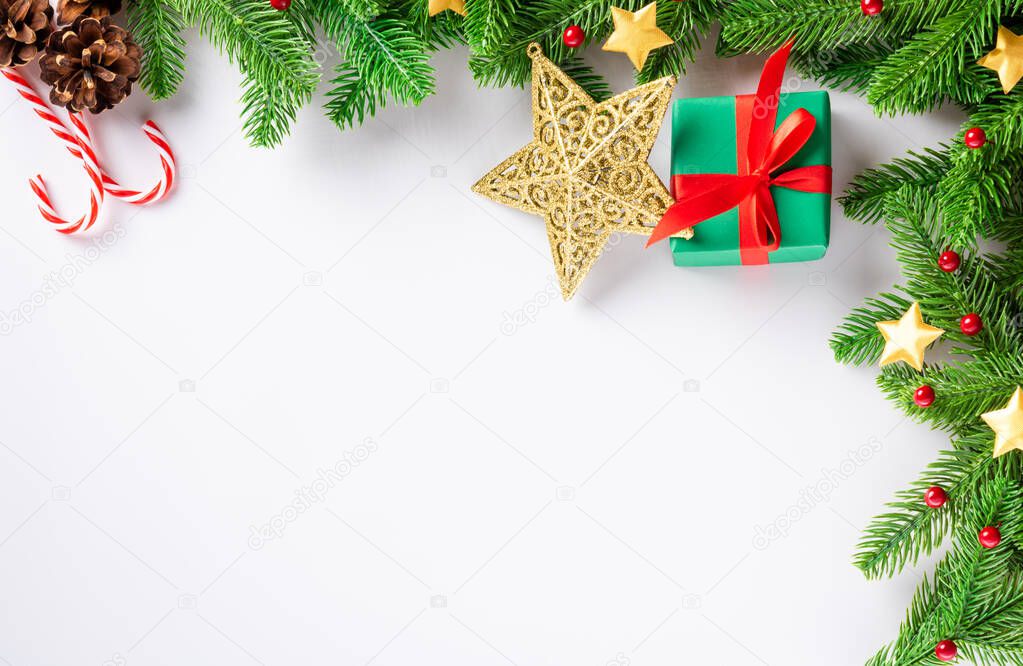 Christmas holiday background fir tree border branch, top view overhead festive Xmas decor studio shot isolated on white background, New year card concept