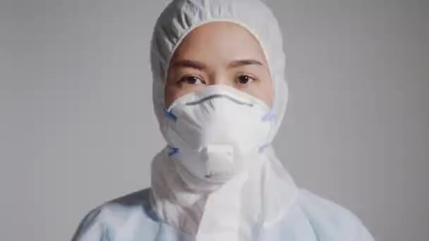 Close Open Eye Asian Doctor Protective Hazmat Ppe Protective Suit — Stock Video