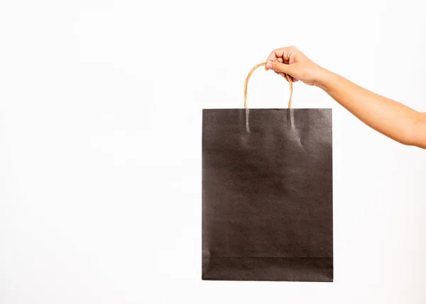 Closeup Women Hand Holding Black Shopping Bag Studio Shot Isolated — Stockfoto