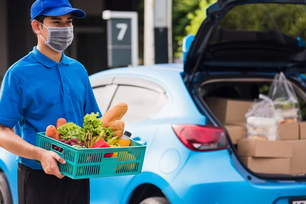 Asian Grocery Store Delivery Man Wearing Blue Uniform Face Mask — Stock Photo, Image