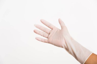 Kadın beyaz kauçuk kauçuk cerrahi eldiven giyiyor, doktor için, stüdyo çekimi beyaz arka planda, hastane tıbbi enfeksiyon kontrolü konsepti