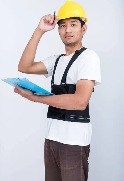 Worker Man Stand Write Book Note Wearing Back Support Belt — Stock Photo, Image