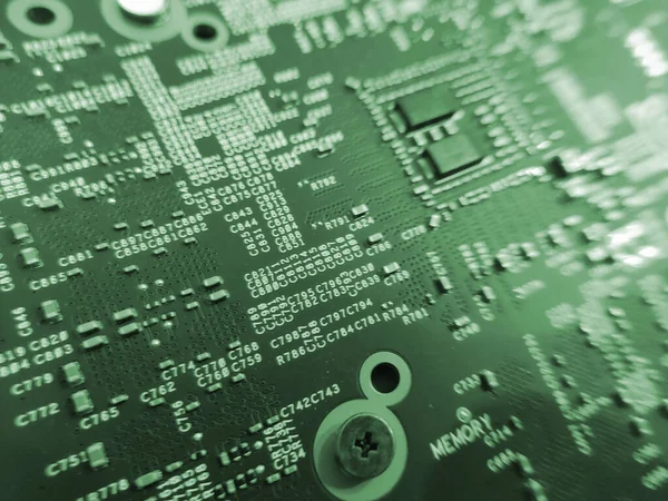 Computer engineering microchip blurred background. Microelectronic high tech wallpaper. Motherboard hardware, electronics conceptual photography