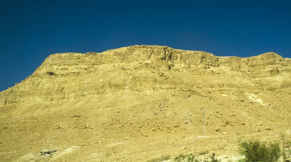 Pietre gialle e montagne nel deserto della Giudea — Foto Stock