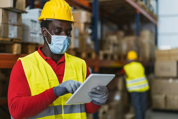 Black Man Working Warehouse Doing Inventory Using Digital Tablet Loading Stock Picture